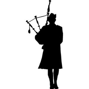 silhouette of a bagpiper